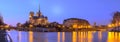 Night panoramic view of Cite island anf Notre-Dame cathedral, Paris. Royalty Free Stock Photo