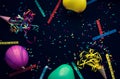 Night party concepts with colorful confetti paper and other props on dark background Royalty Free Stock Photo