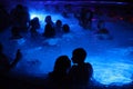 Night party in thermal bath in Budapest, Hungary. Royalty Free Stock Photo