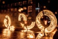 Night performance fire show in front of a crowd of people