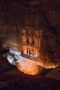 Night Petra, by candlelight, a treasury monument Al-Khazneh in the archaeological site of Petra, Jordan. Royalty Free Stock Photo