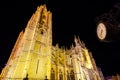 Night photo of the cathedral of Leon in Spain with urban clock in front of the building. Royalty Free Stock Photo