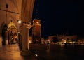 Night photo of the central square Rynok Glavny with the Town Hall Tower in Krakow Poland Royalty Free Stock Photo