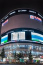 NIght photo of corner with TV screen at Shinjuku.