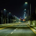 Night photo of empty four lane street