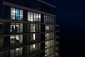 Night photo highrise tower view of interior apartments