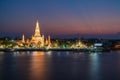 Night photo illuminated old Wat Arun Ratchawararam Ratchawaramahawihan or Wat Arun Royalty Free Stock Photo