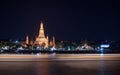 Night photo illuminated old Wat Arun Ratchawararam Ratchawaramahawihan or Wat Arun