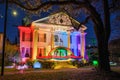 Night Photo of Mansion Decorated for Mardi Gras