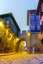 Night photo of old houes and ancient fortress entrance of old town of Plovdiv, Bulgaria Royalty Free Stock Photo