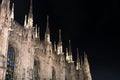 Night photo of the spiers of the Milan Cathedral