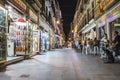 Night photo of streets of Granada with shops and cafes 30.Sept.2020 Albacin, Spain. Long light trails and blurred people motions