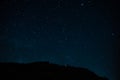 Night photograph depicting stars. Night cosmic sky. Astrophotography
