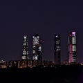 Night photography of the 4 towers of Madrid. Construction of the fifth tower