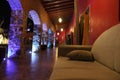 Night photography, view of the hacienda construction with stone arches and colored lighting