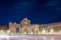 Night picture of Puerta de Alcala with traffic in Madrid, Spain