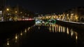 Night picture of the river liffey and bridges Dublin Ireland reflections Royalty Free Stock Photo