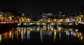 Night picture of the river liffey and bridges Dublin Ireland reflections Royalty Free Stock Photo