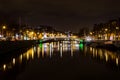 Night picture of the river liffey and bridges Dublin Ireland reflections Royalty Free Stock Photo