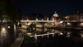 Night picture of Tiber, bridge Ponte Vittorio Emanuele II and dome of  St. Peter`s Basilica at the background. Rome at night Royalty Free Stock Photo