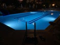 Night pool side of rich hotel trademarks were removed Royalty Free Stock Photo
