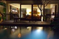 Night pool and terrace for rest behind Royalty Free Stock Photo