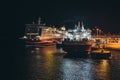 At night in the port MS Mariella leaving and MS Rosella moored, seen from MS Silja Symphony Royalty Free Stock Photo