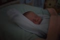 Night portrait of sleeping little baby boy, low light Royalty Free Stock Photo