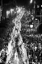 Night procession through Seville by penitents