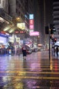 Night rain at Tsim Sha Tsui crossing in Kowloon, Hong Kong Royalty Free Stock Photo