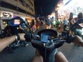 Night ride bike street first person view scooter asia thailand urban city ride Royalty Free Stock Photo