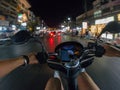 Night ride bike street first person view scooter asia thailand urban city ride Royalty Free Stock Photo