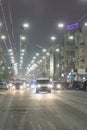 Night road in the city of lights cars traffic jams. Winter traffic in the city. vertical photo Royalty Free Stock Photo