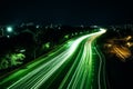 Night road with green lines. Green transportation and decarbonization concept