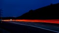 Night road lights. Lights of moving cars at night. long exposure red, blue, orange, multicolored