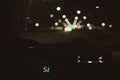 Night road. View from inside car. Natural light. Street and other cars is motion blurred Royalty Free Stock Photo