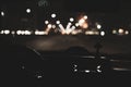 Night road. View from inside car. Natural light. Street and other cars is motion blurred Royalty Free Stock Photo