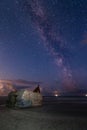 A night scape of an old German Bunkers transformed into mule sculptures on the beach of Blavand, Denmark, with the milky way in Royalty Free Stock Photo