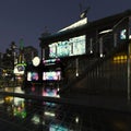 Night scene, buildings, rain, bright lights, 3D rendering Royalty Free Stock Photo