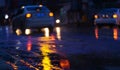 Night scene of hard rain fall in the city. Royalty Free Stock Photo