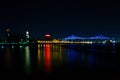 Night scene of a city skyline with light reflection on the lake Royalty Free Stock Photo
