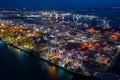 Container ship loading and unloading in deep sea port, Aerial view at night Royalty Free Stock Photo