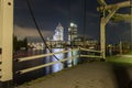 Night scene with drawbridge at Amstel river in Amsterdam