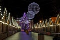 Night scene - empty Christmas marketplace with decorated small kiosk