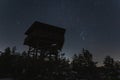 Night scene, Estonian nature in winter time, observation tower on the Viru swamp and clear starry sky Royalty Free Stock Photo