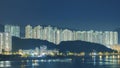 High rise residential buildings and harbor of Hong Kong city Royalty Free Stock Photo