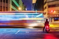 Night scene of a man waiting at traffic lights Royalty Free Stock Photo