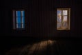 Night scene of moon seen through the window from dark room. Moonlight inside dark room Royalty Free Stock Photo