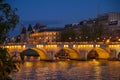 Night scene of the New Bridge (Pont Neuf in French) against the Court of Cassation and the Conciergerie Royalty Free Stock Photo