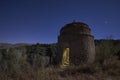 Night scene of the old Arab watchtower in the Fuente Camacho salt flats in Granada. Spain Royalty Free Stock Photo